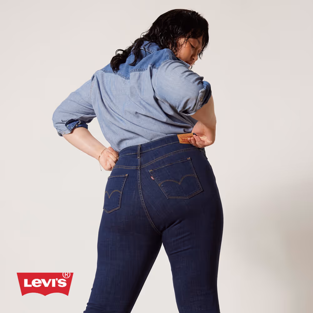 Model wearing Levi's denim jeans and denim shirt