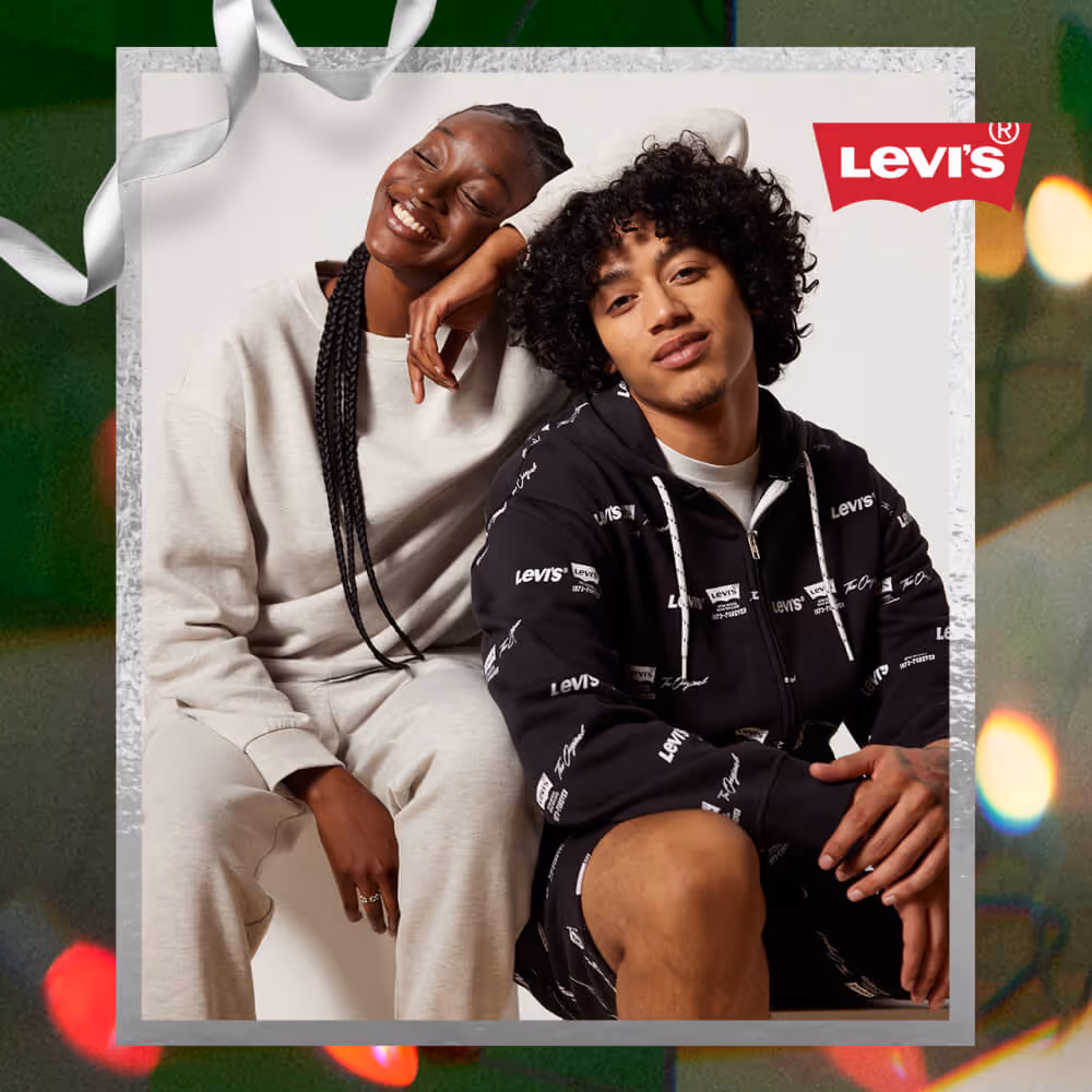 Two models wearing Levi's sweatsuits