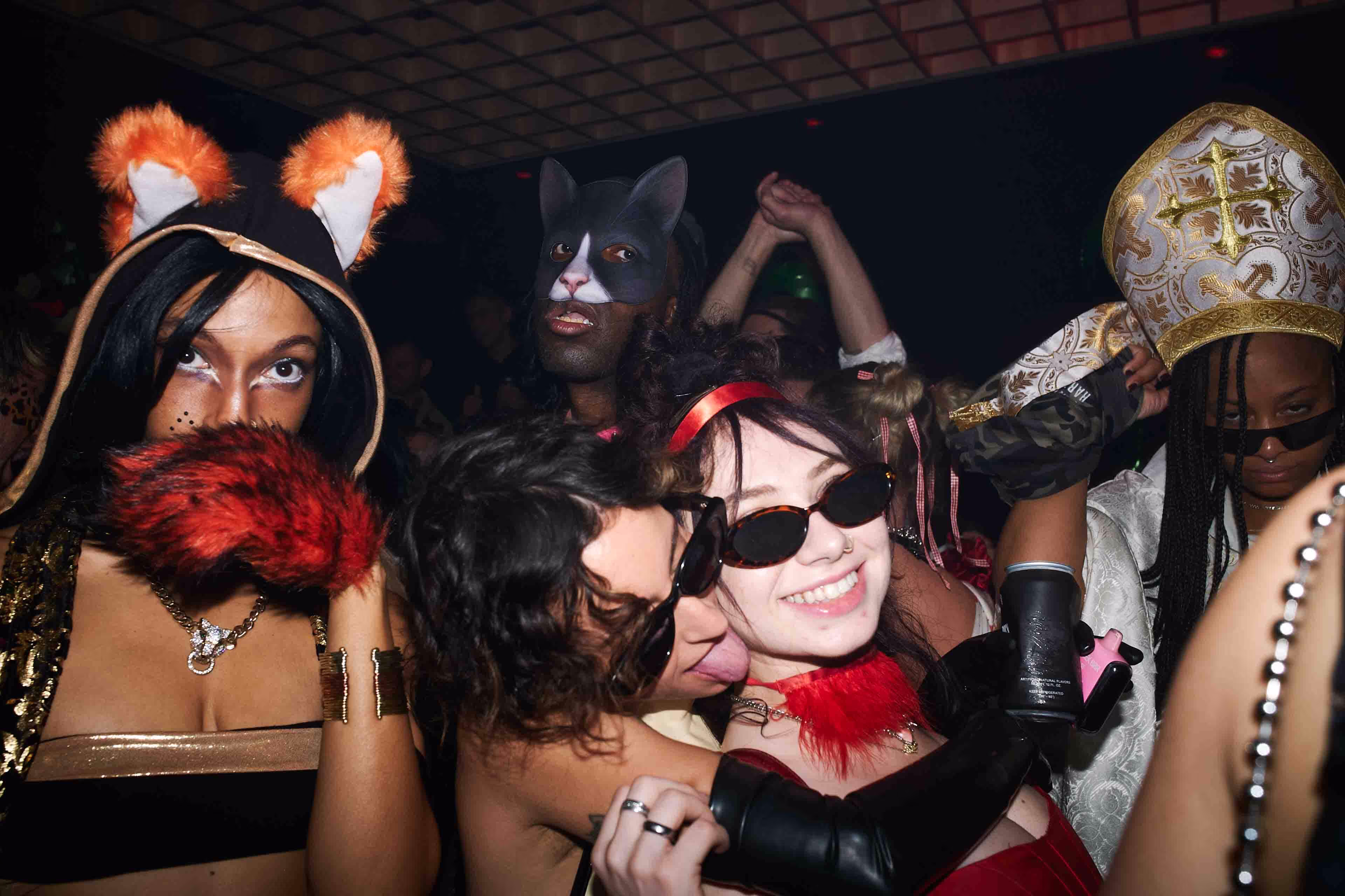 A group of people in costumes at a party.