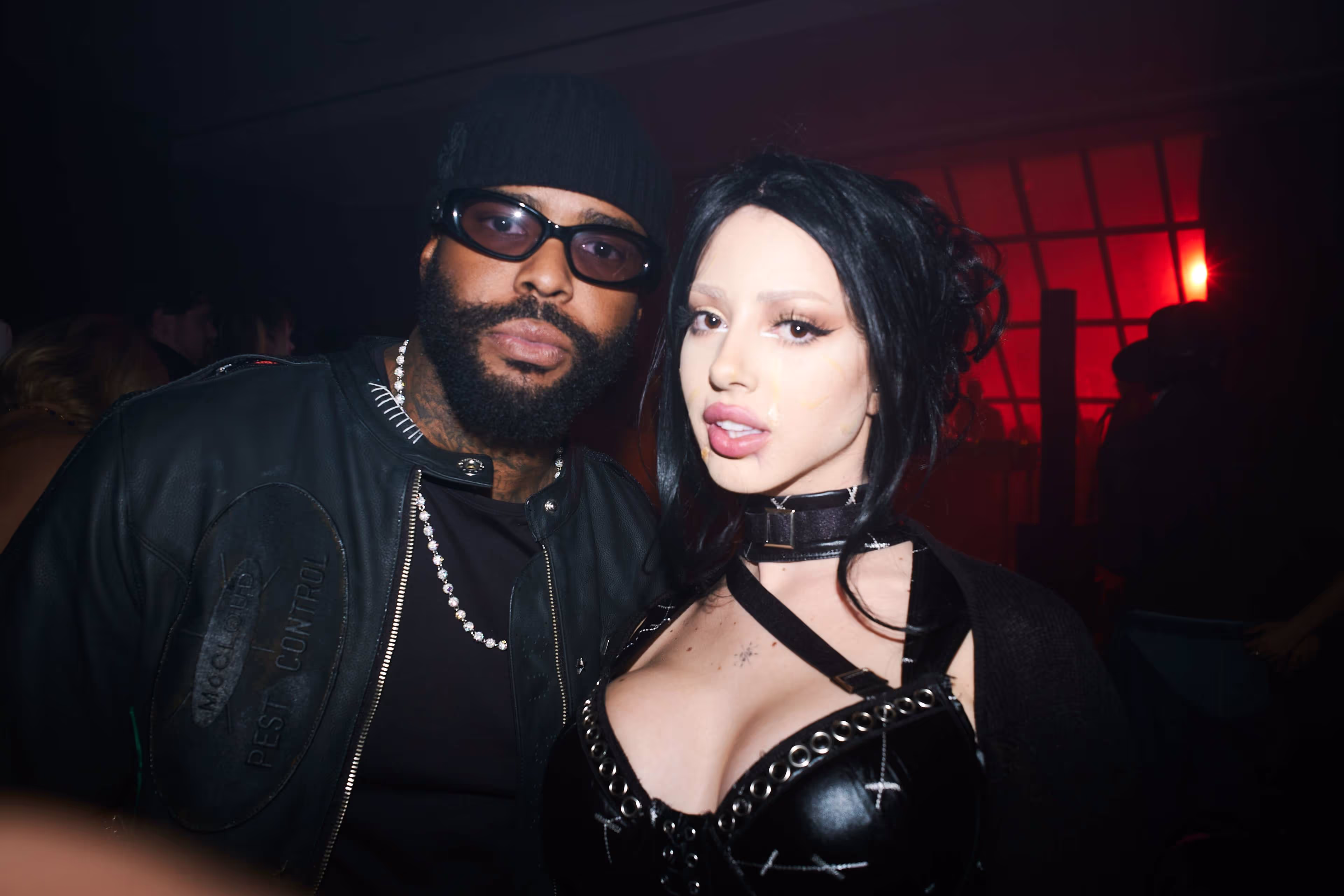 A man and a woman posing for a picture.