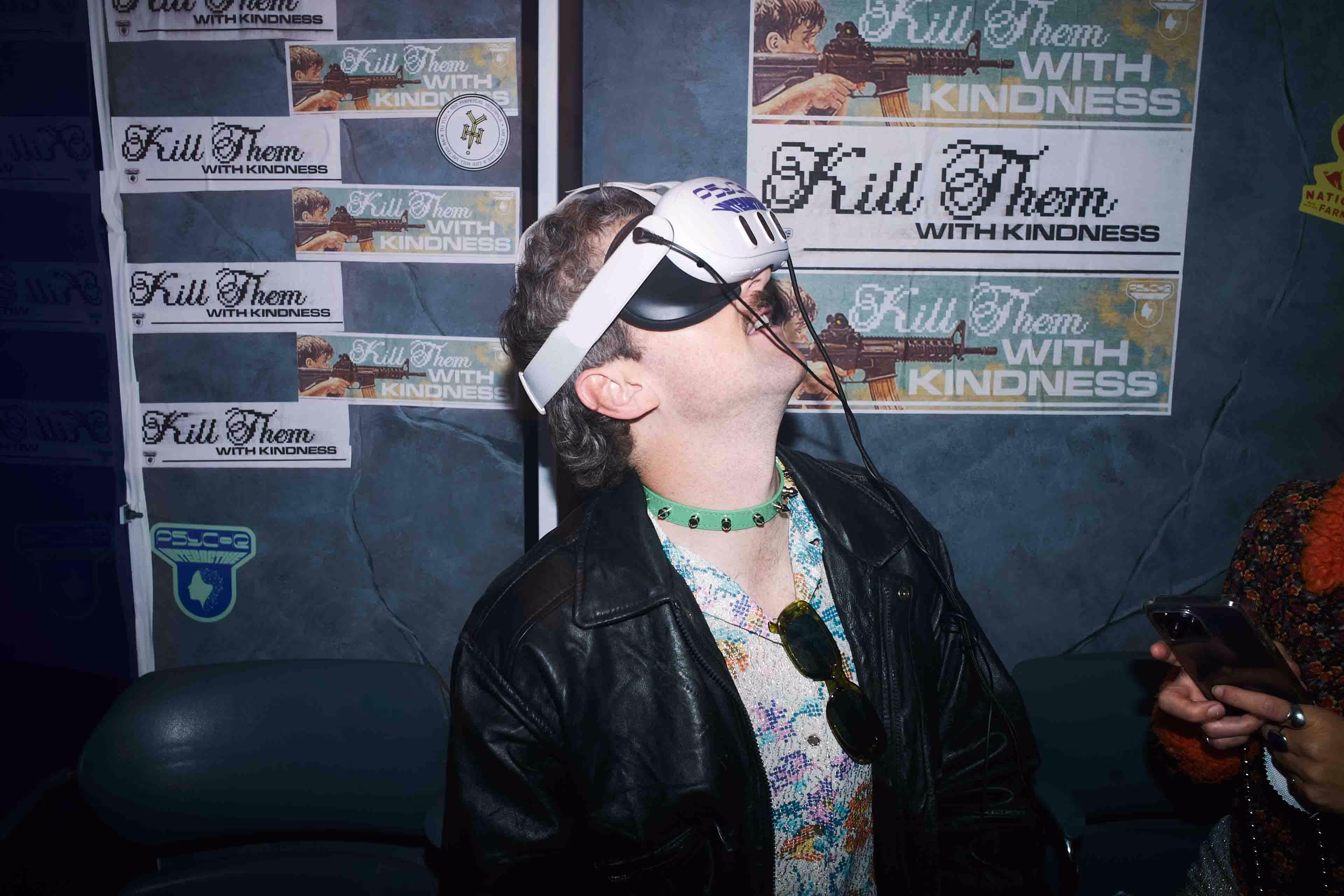 A young man wearing a blindfold and looking up.