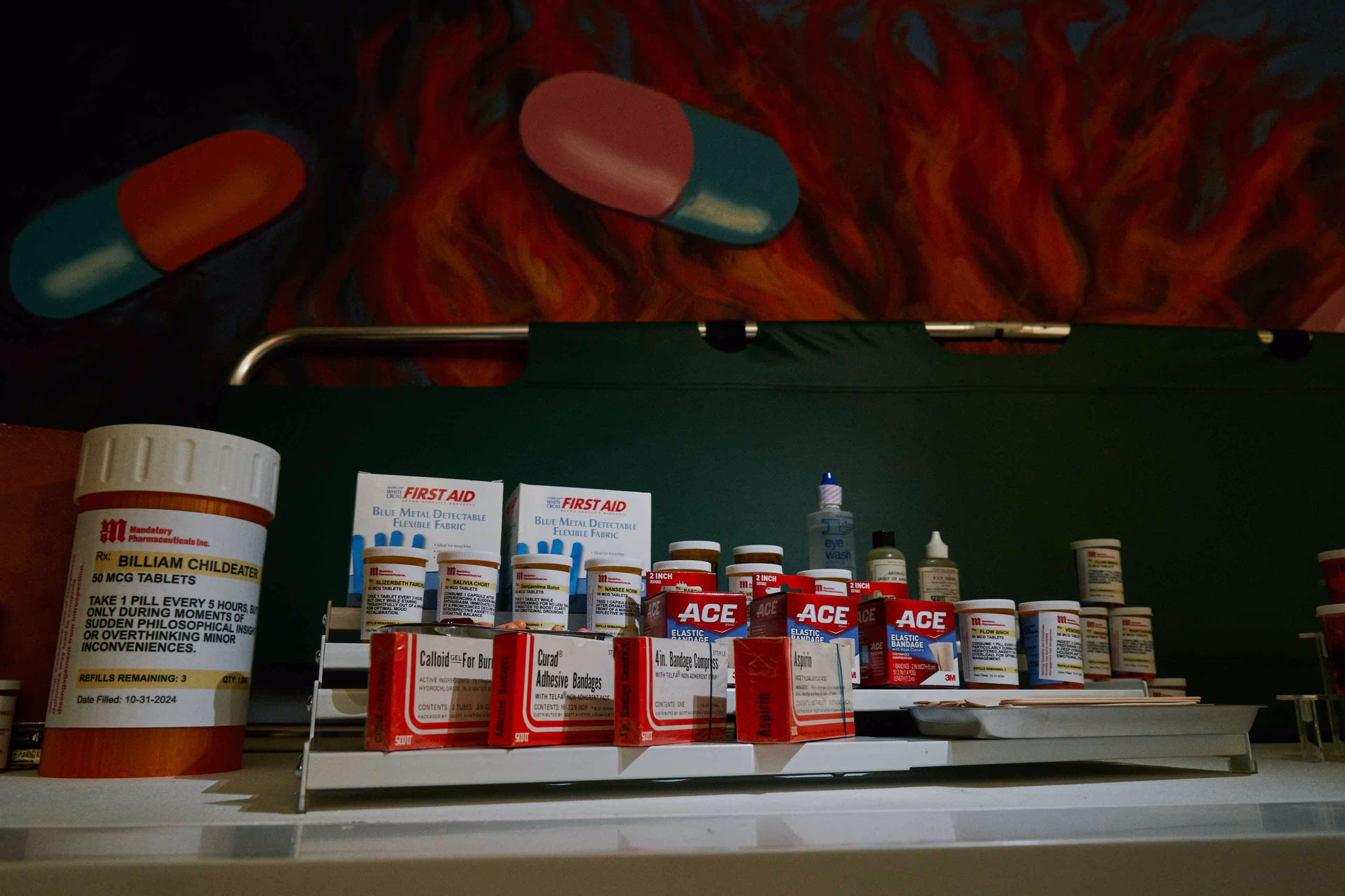 A shelf filled with lots of different types of medicine.