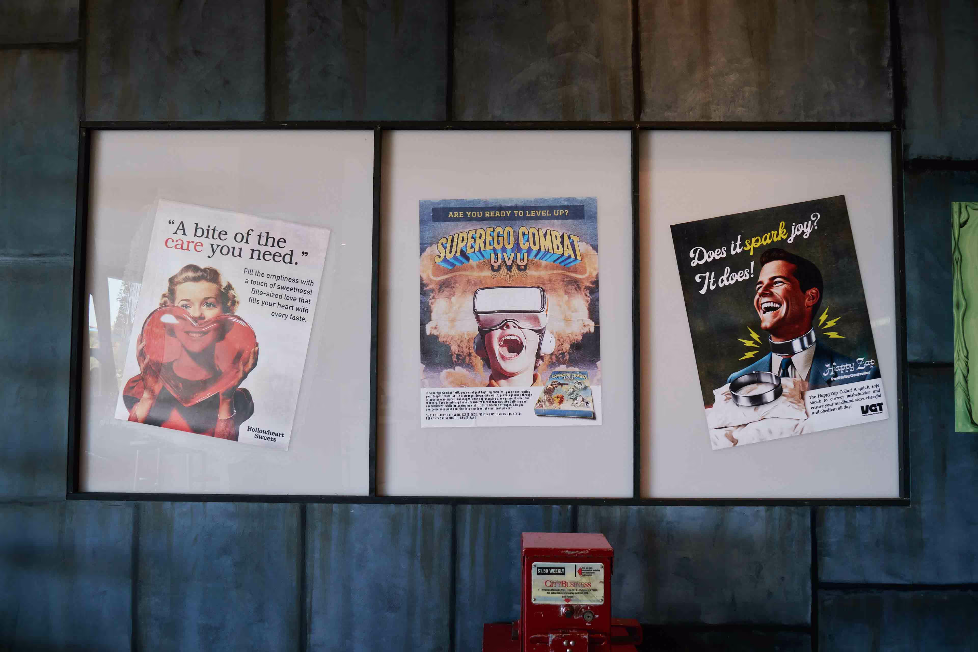 A group of posters hanging on a wall.