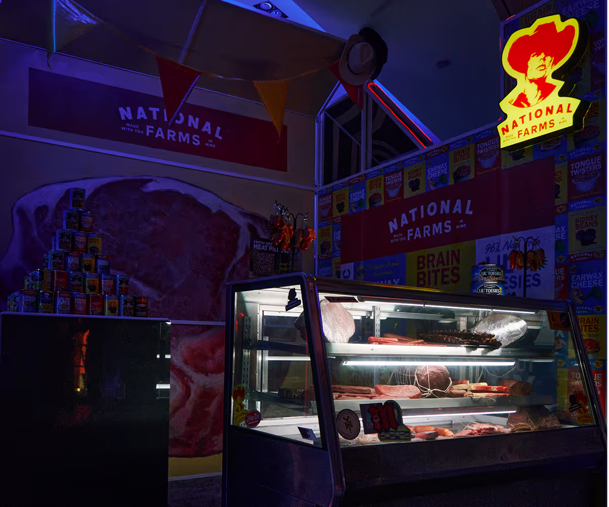 A display case in a store filled with meat.