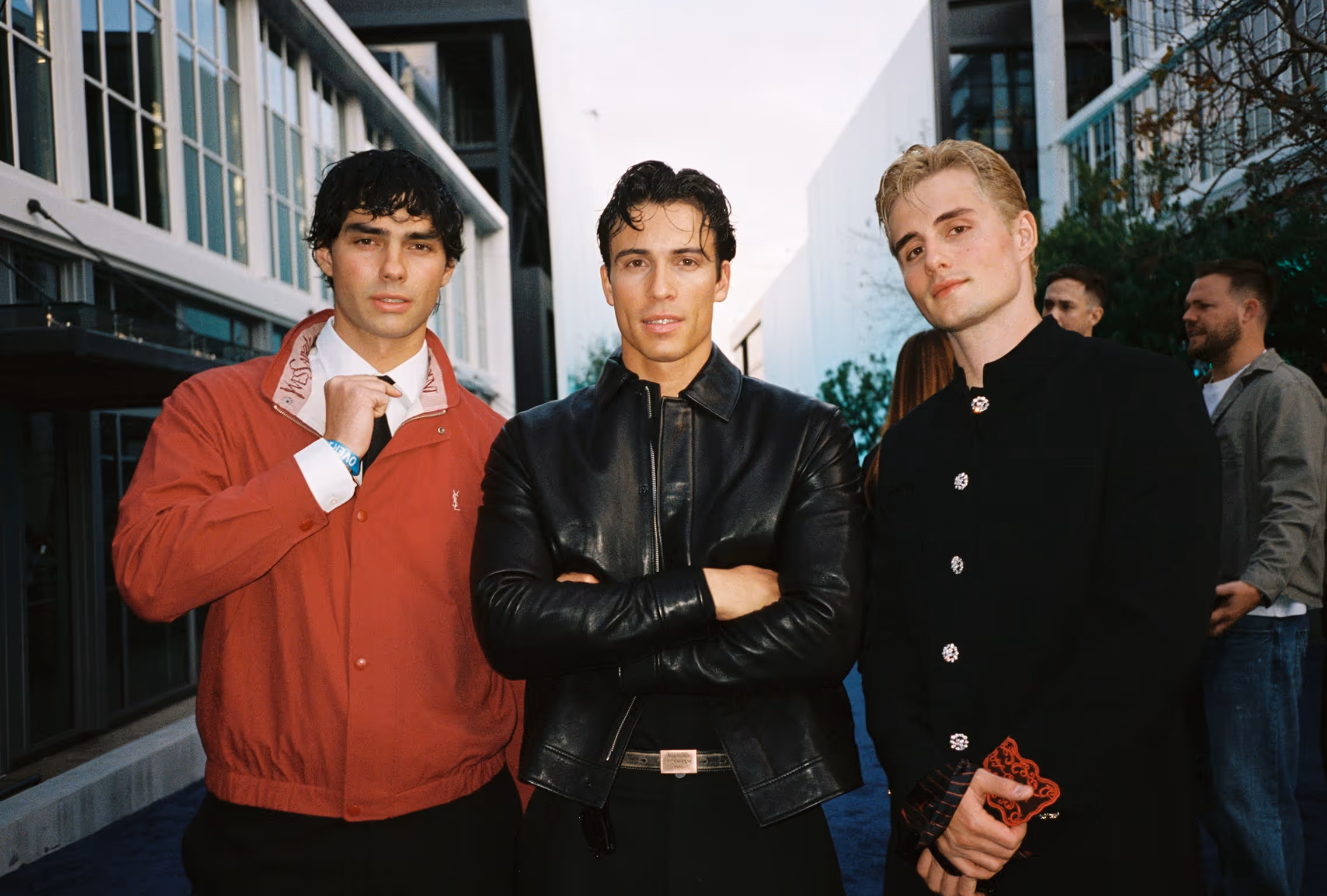 A group of young men standing next to each other.