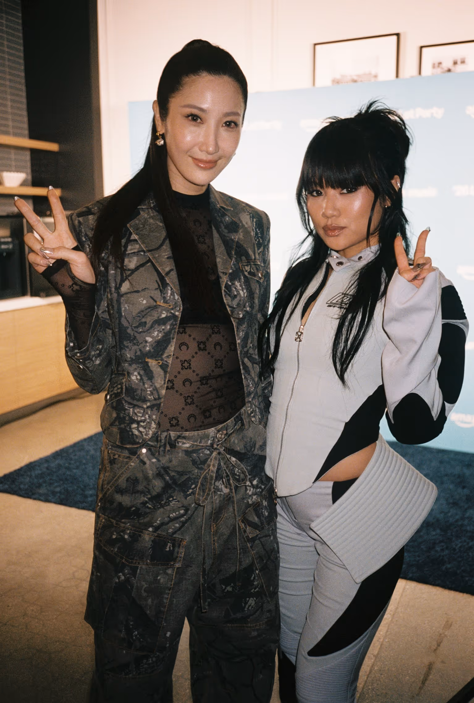 A couple of women standing next to each other.