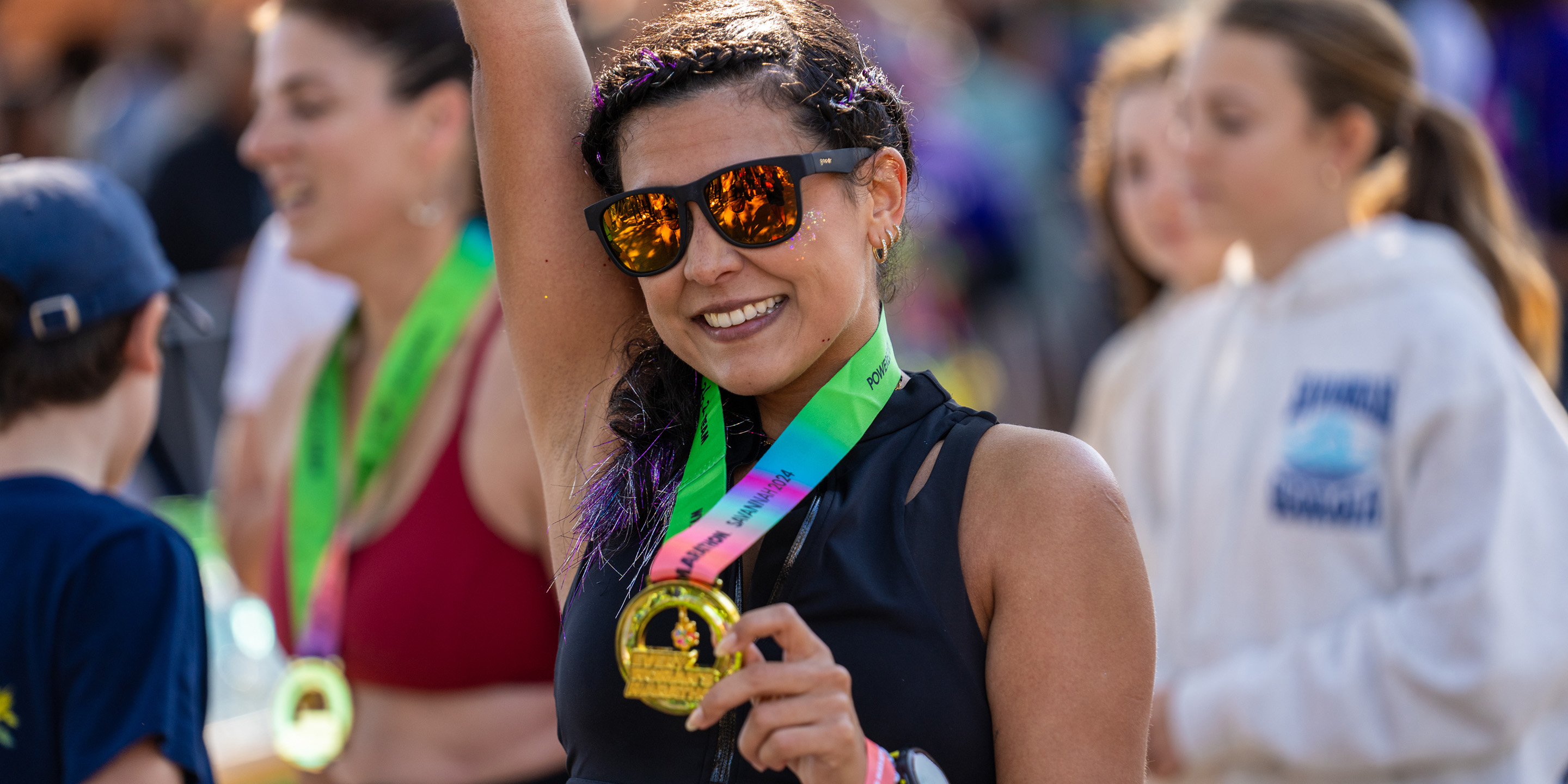A building with a digital ad showcasing people on roller skates and the tagline "Milk hydrates better than water."
