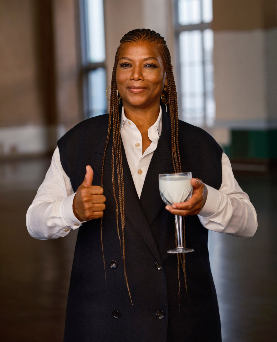 A digital Sign on a New York City subway platform depicting a woman runner and a QR code