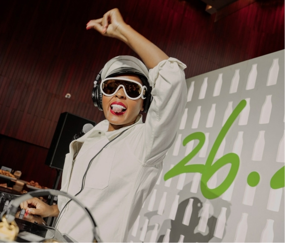 A 3d Billboard depiction a woman's hand reaching out toward the viewer