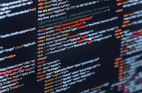 A picture of a display with code going all across it signifying the Web, App, & Software Development category of Independent Professionals on Equilink