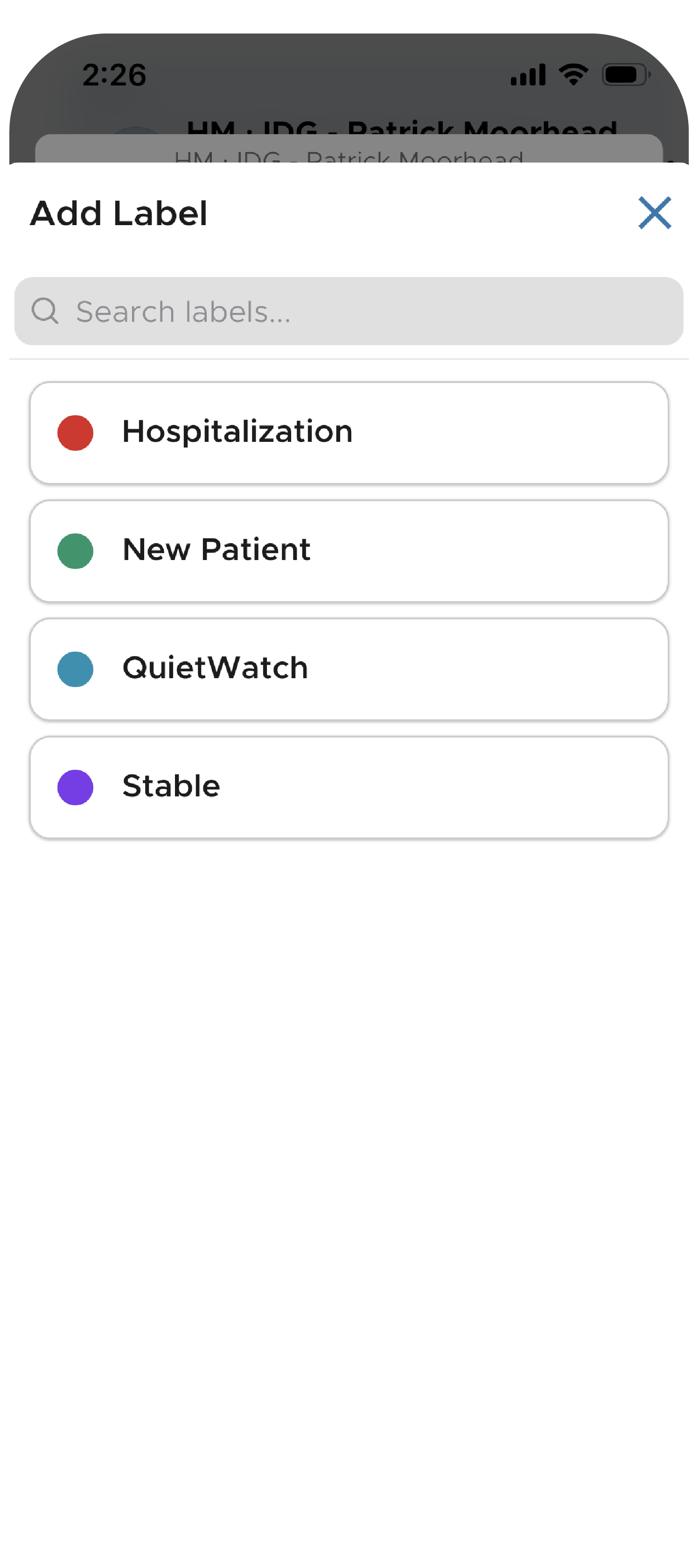 Screenshot of QliqCHAT HIPAA-Compliant Texting App showcasing the ability to apply labels that facilitate conversation-centric workflows