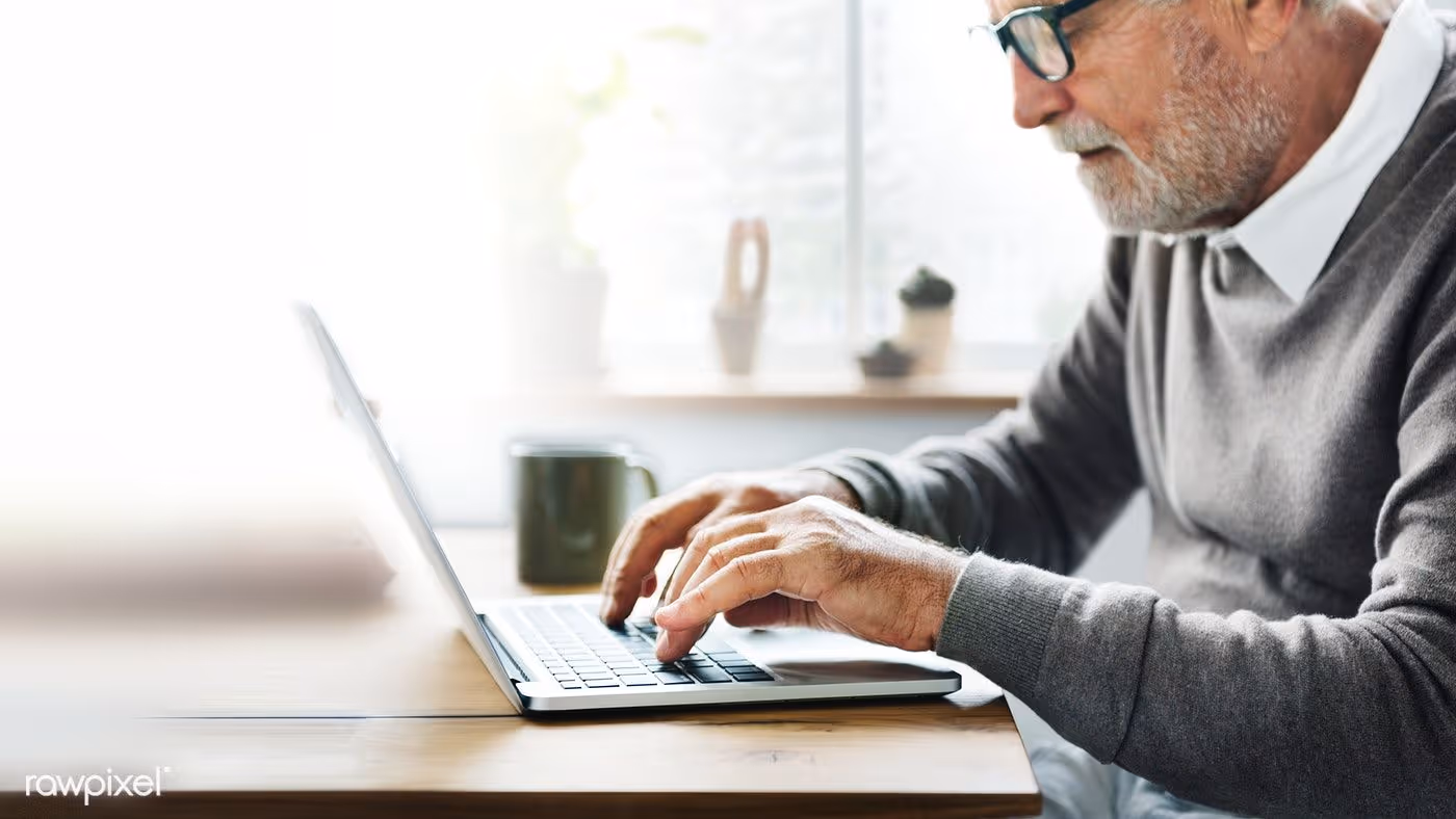 Old woman using a laptop