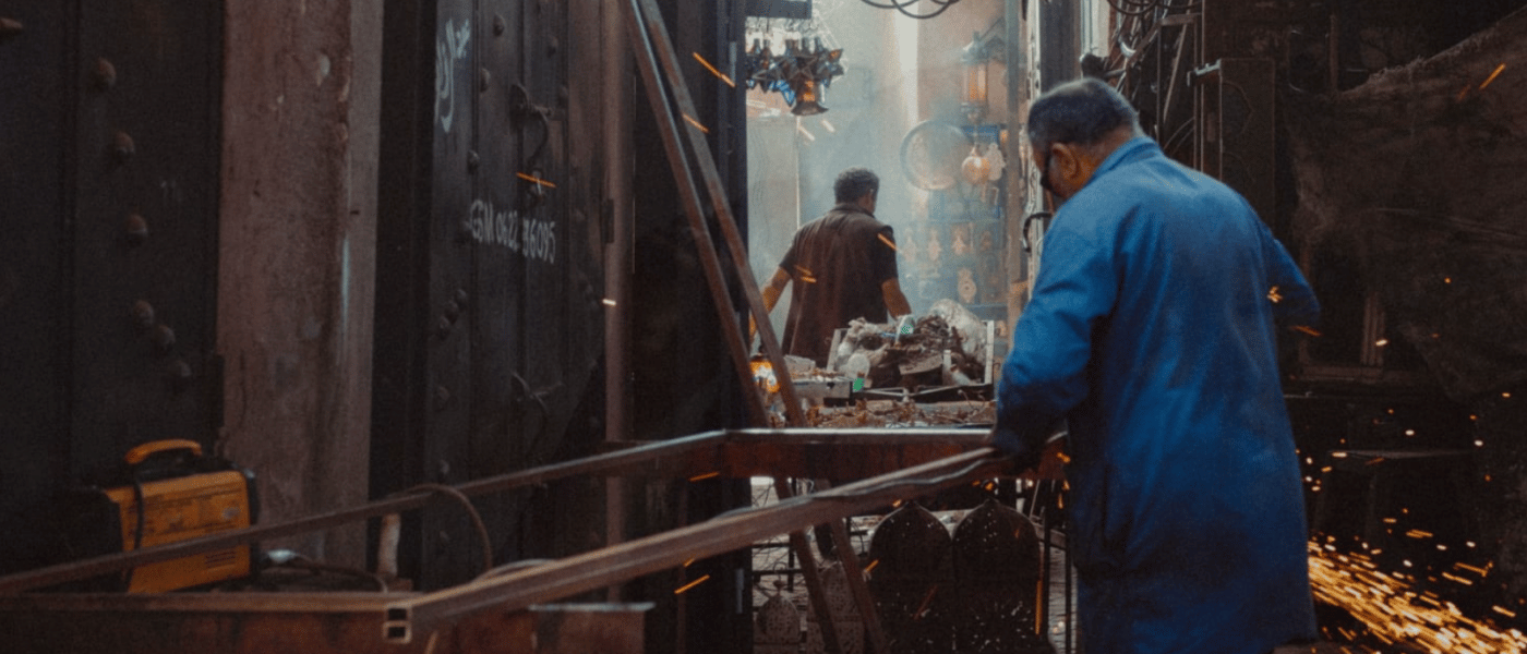 Man working outside in a loud environment