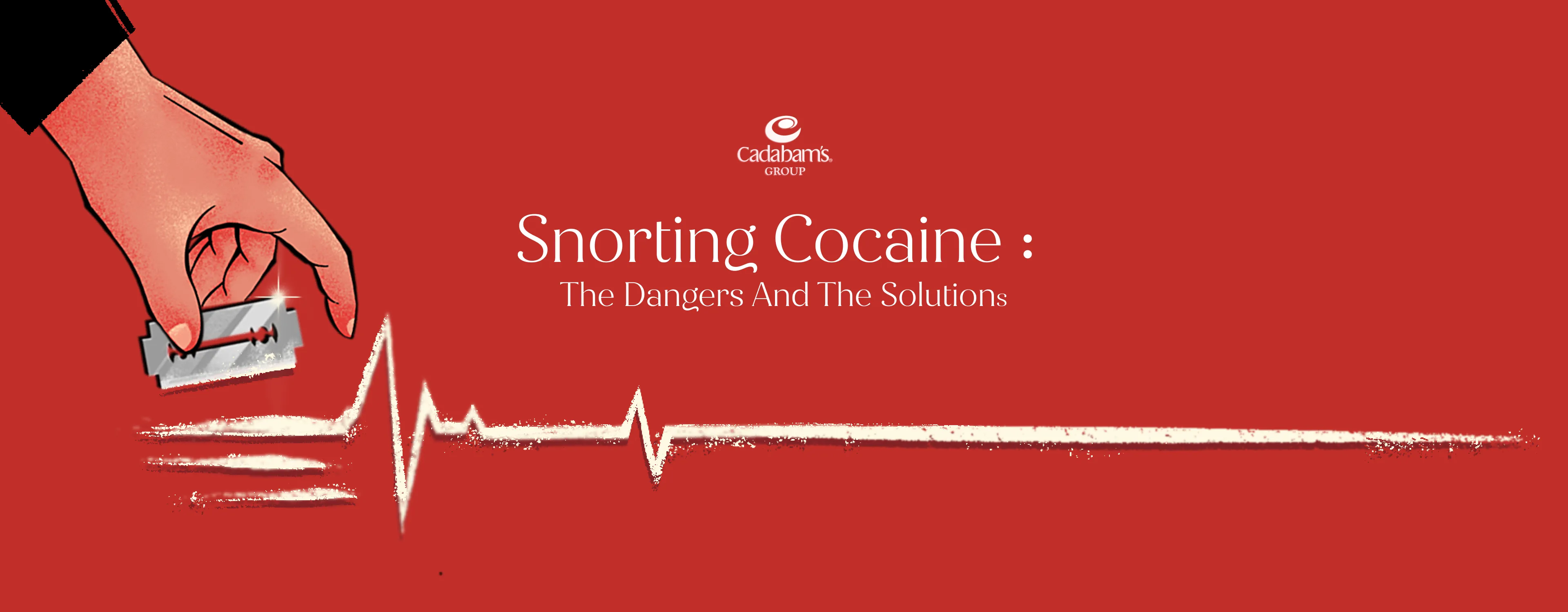 A person holding a blade to make a line of cocaine and engage in substance use.