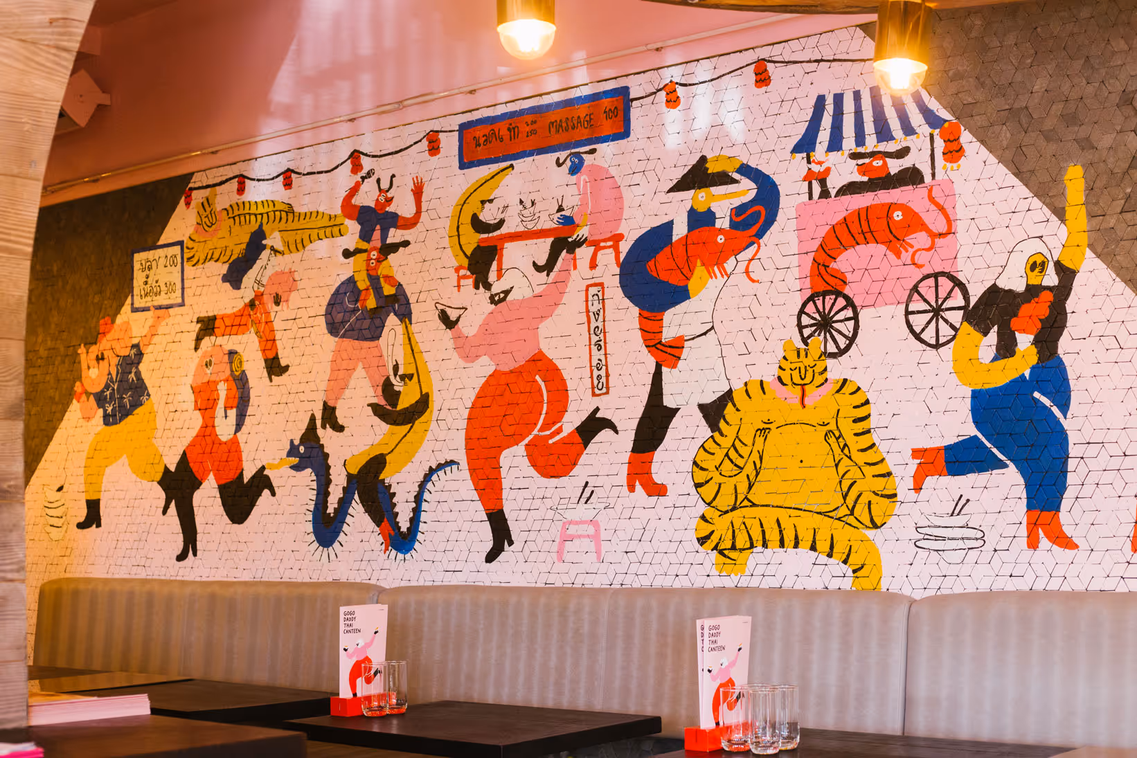 Vibrant mural by Blink at GoGo Daddy Thai Canteen featuring colourful illustrated figures on a tiled wall