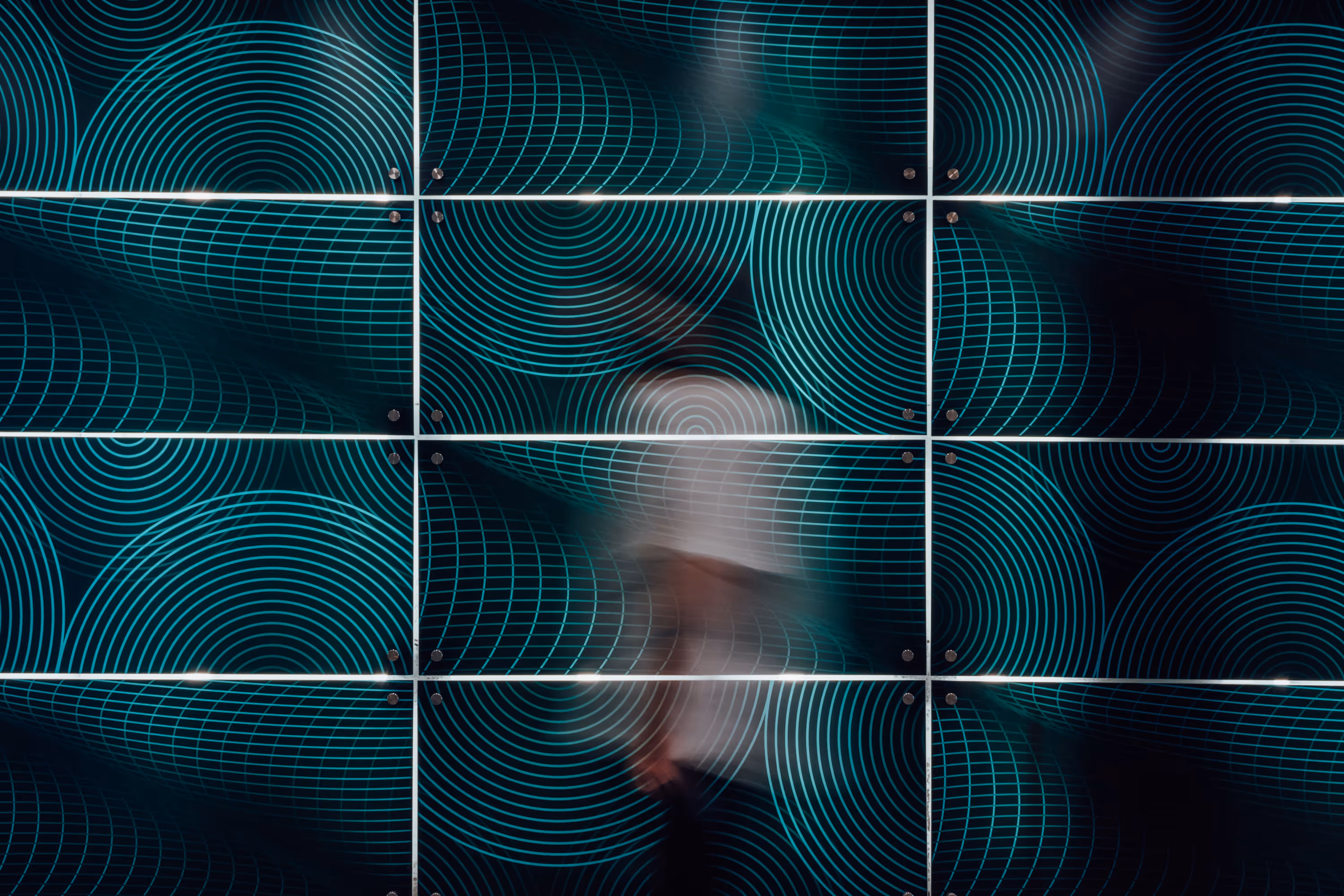 Close-up detail of backlit ocean-pattern wall graphic at 139 Quay Street, designed, fabricated and installed by Blink, Auckland