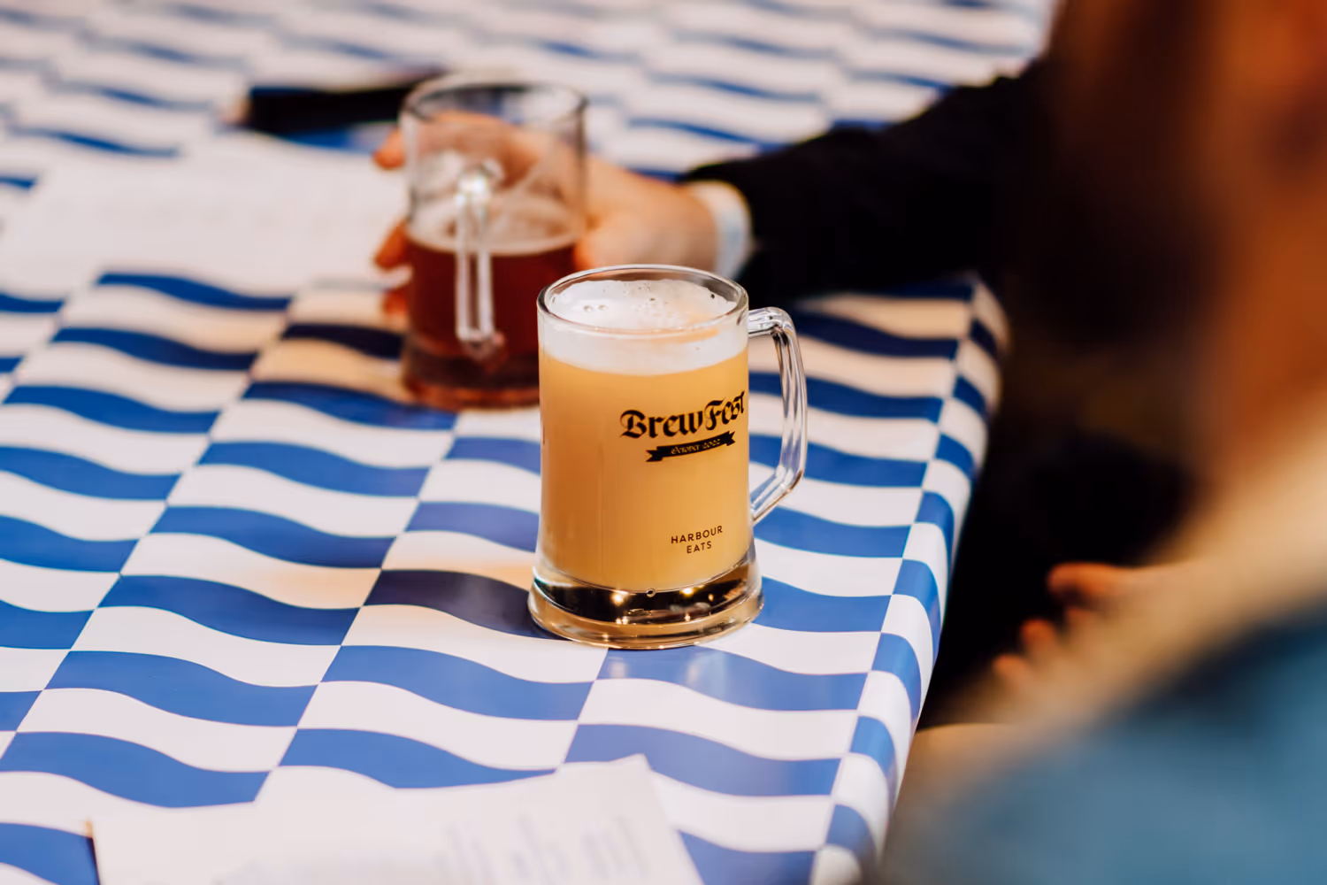 Brew Fest branded beer stein and printed table covering at Commercial Bay, designed by Blink, Auckland
