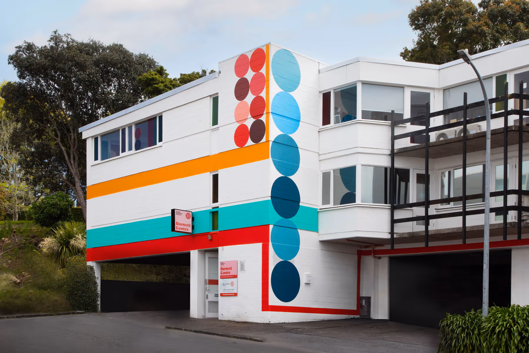 Burnett Foundation Aotearoa exterior supergraphics mural, designed by Shannon Novak, painted and installed by Blink, Auckland