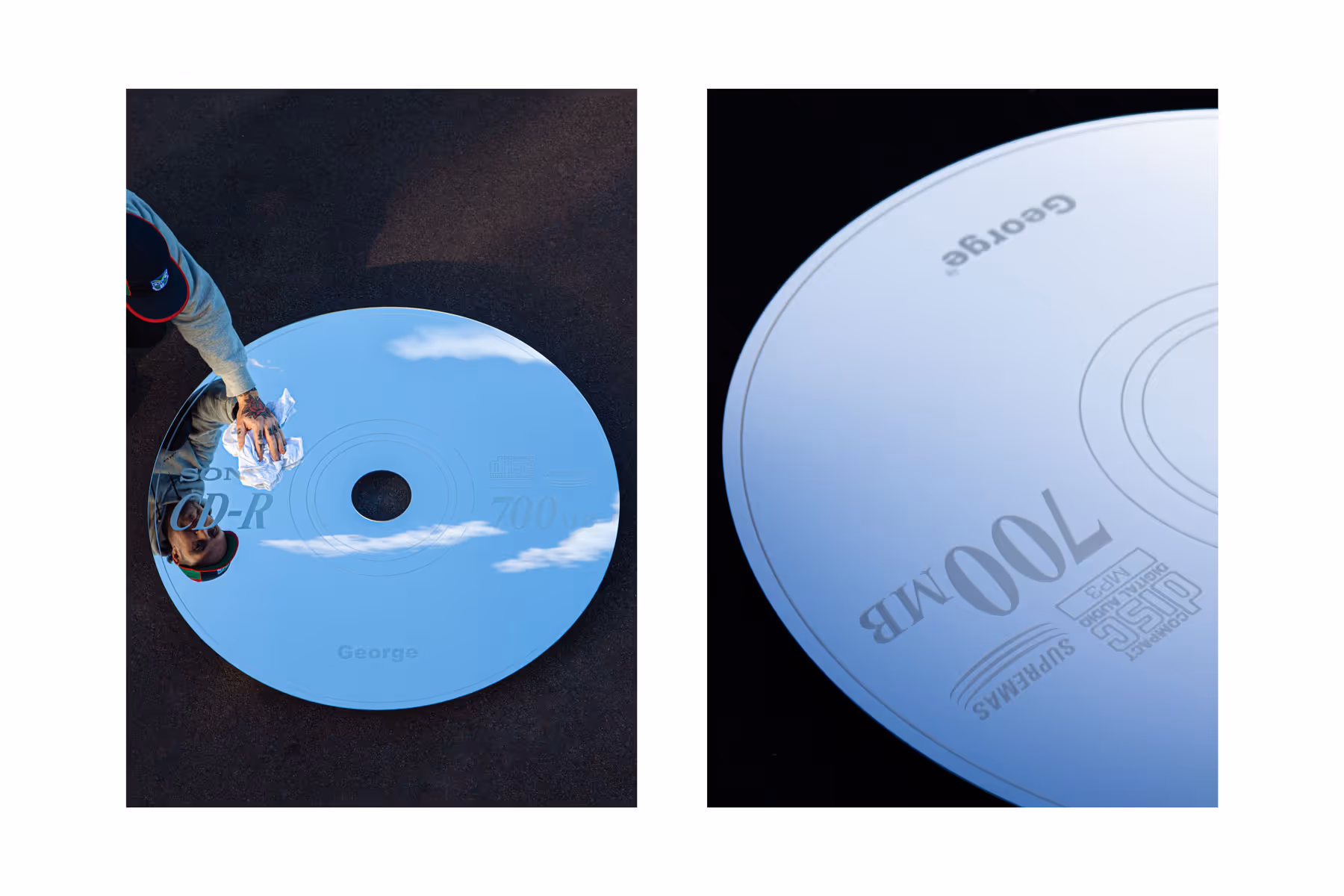 A large, reflective, circular George FM CD-R installation being polished, reflecting the sky