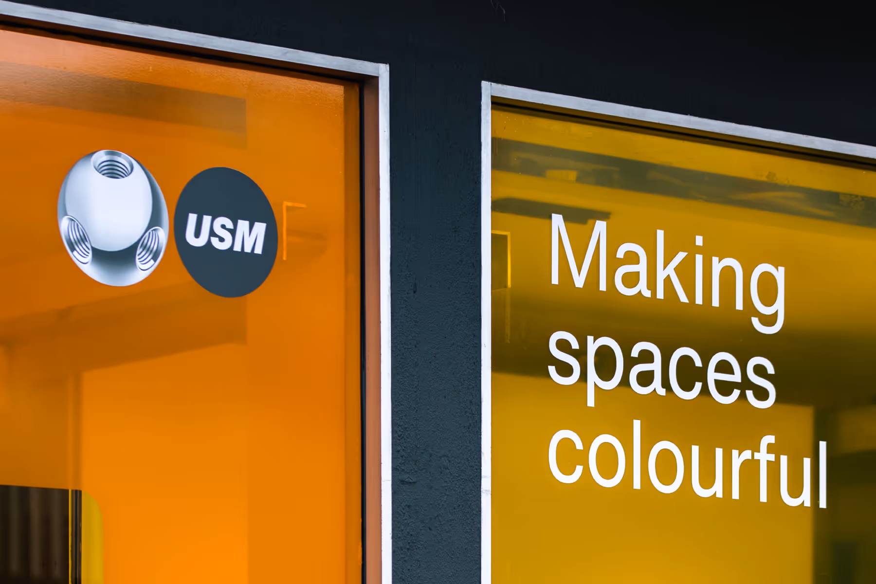 Closeup of ECC USM window display with coloured vinyl treatment designed, printed and installed by Blink, Auckland