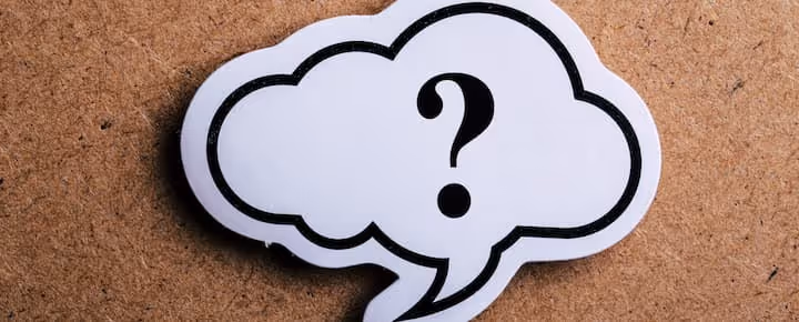 Question mark inside a thought cloud on a brown background
