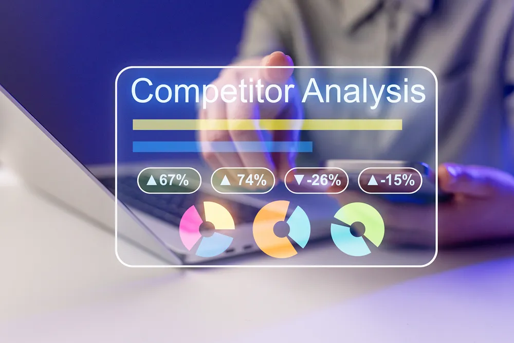 Competitor intelligence and market research dashboard on a laptop