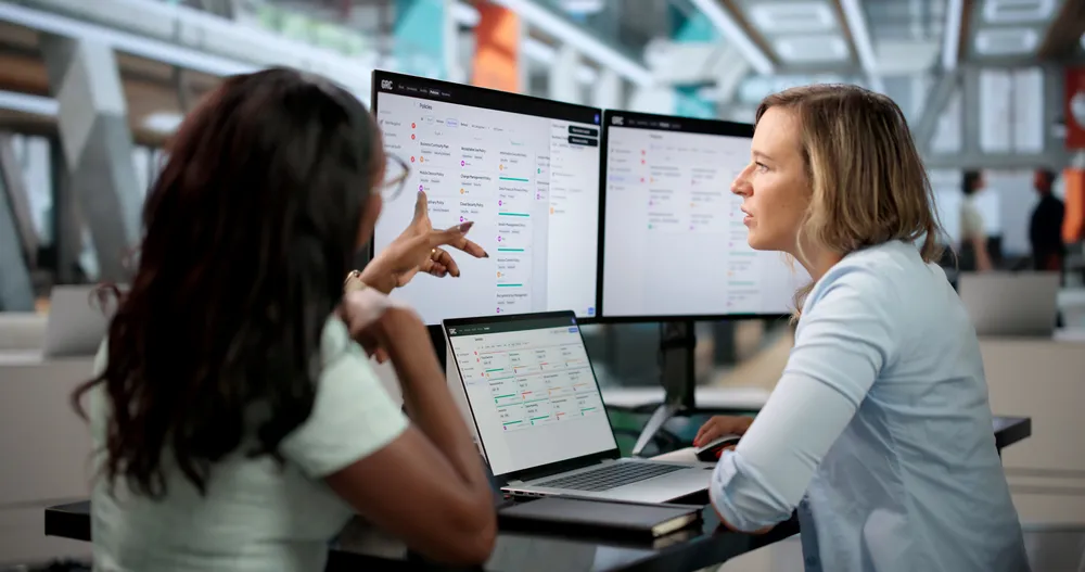 Compliance manager reviewing a security risk register