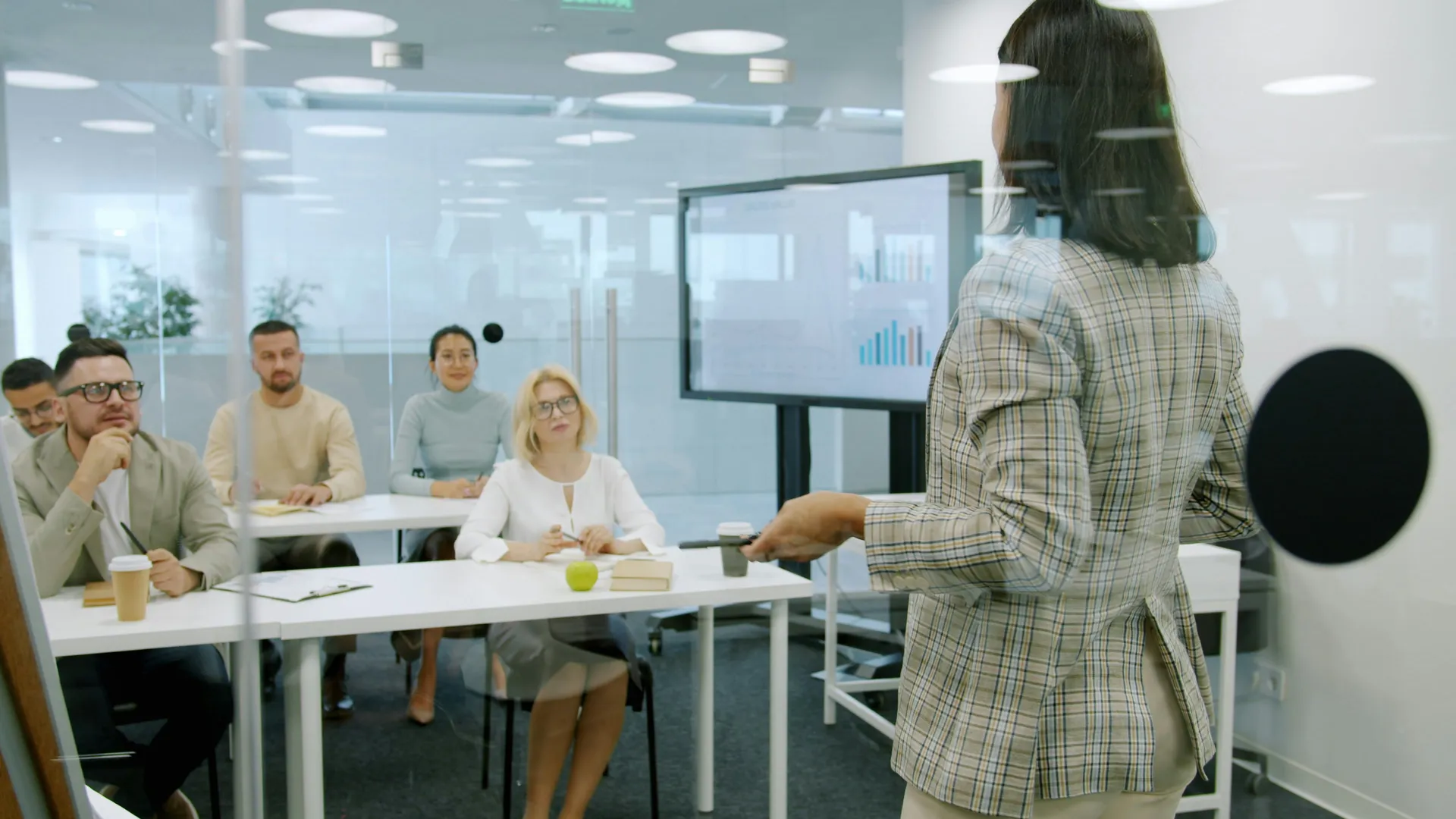 Sales team in a ClickUp training session reviewing pipeline-to-delivery workflows