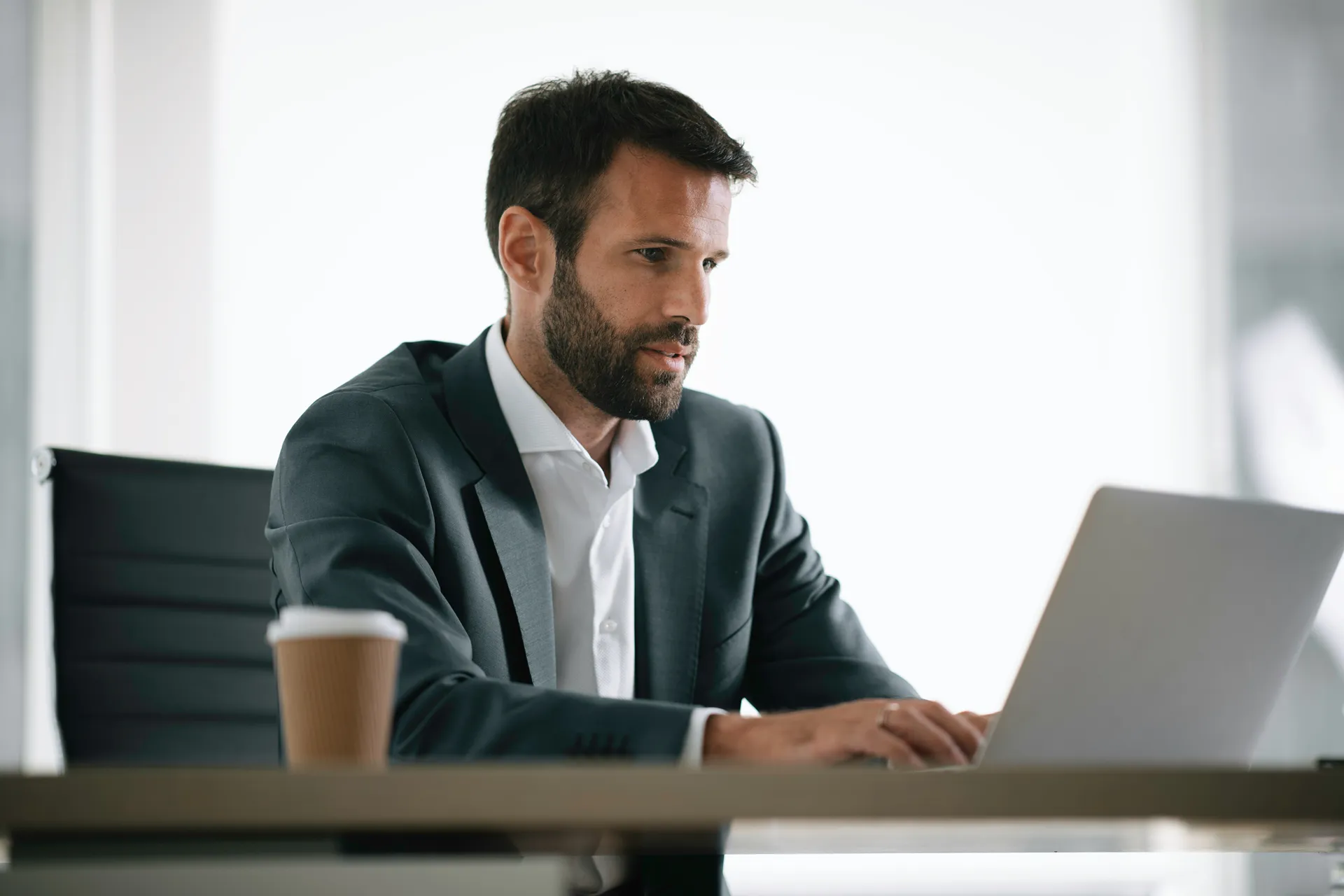 PMO lead comparing Smartsheet and ClickUp portfolio dashboards