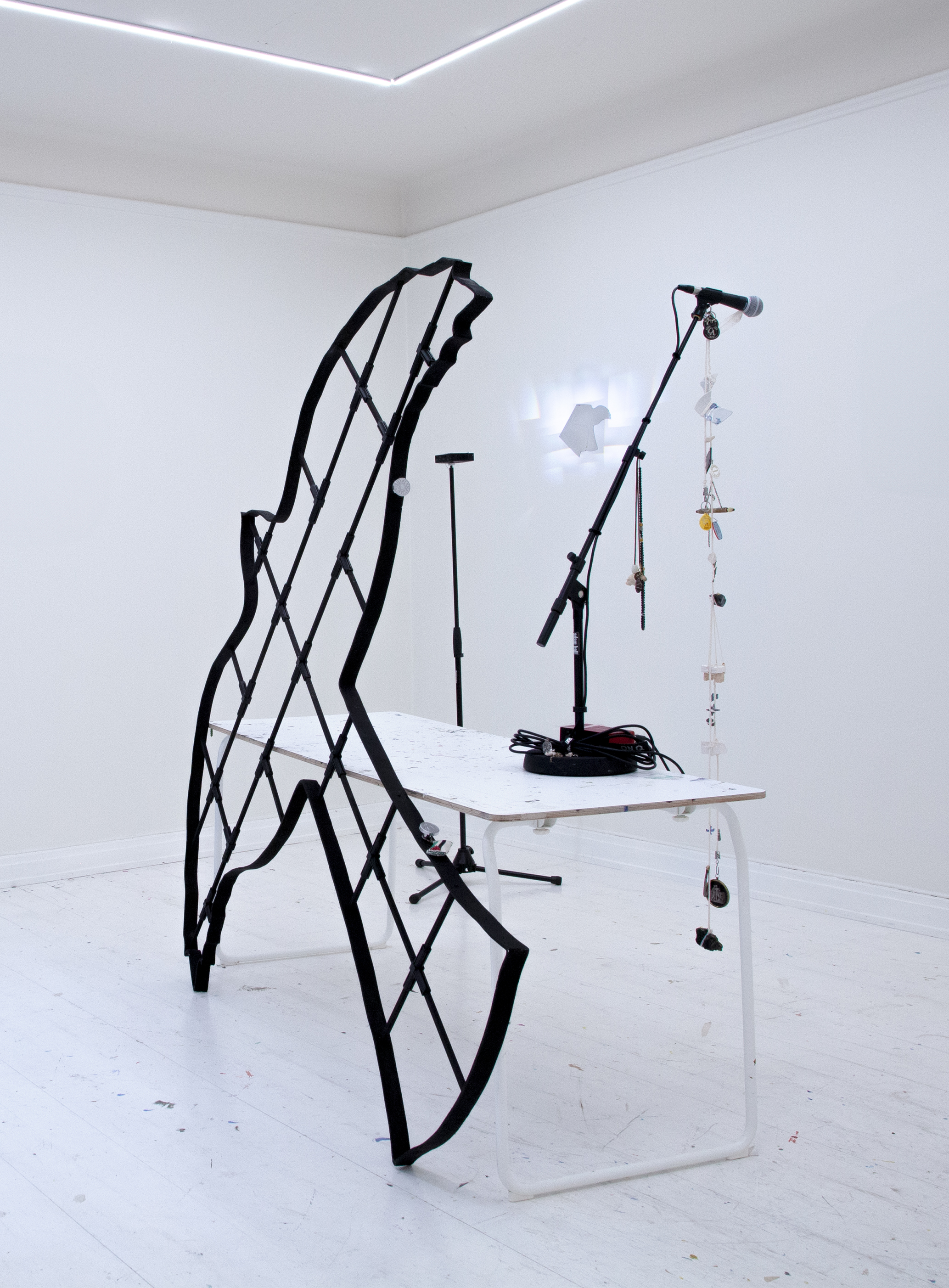 center: worktable. leaning against table:.. within the frame of painting.. hand-cast laminate frame; glass fibre, aluminium.. 182 × 208 × 3,5 cm