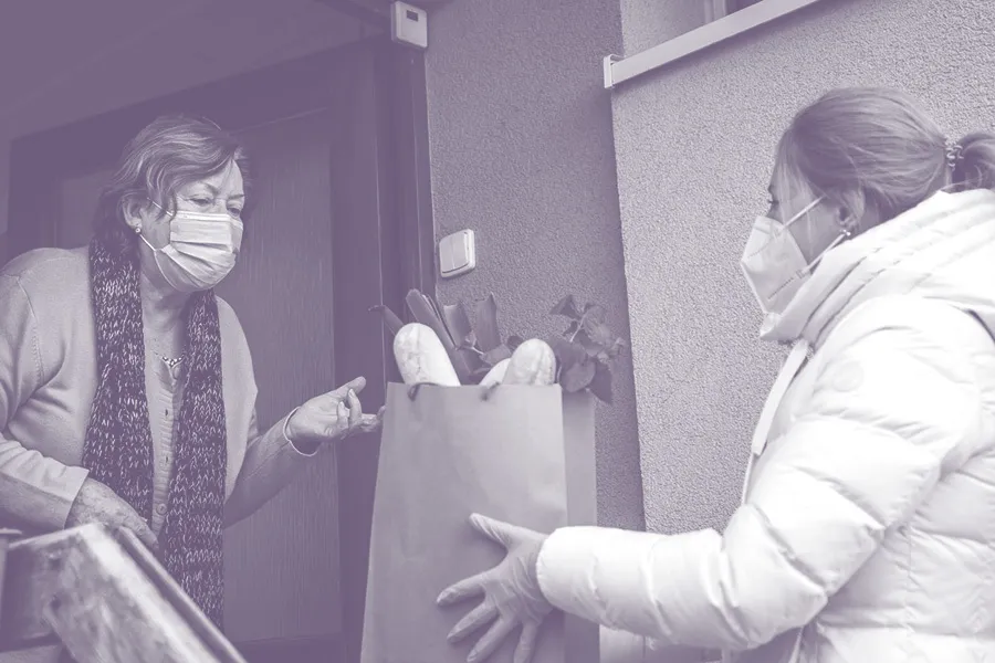 women delivering groceries during pandemic