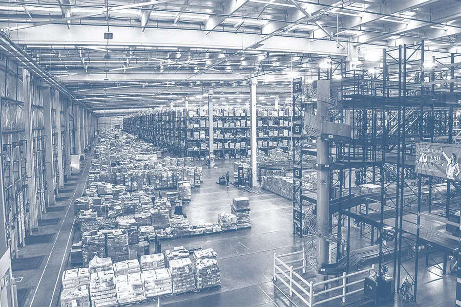 Busy warehouse with forklifts