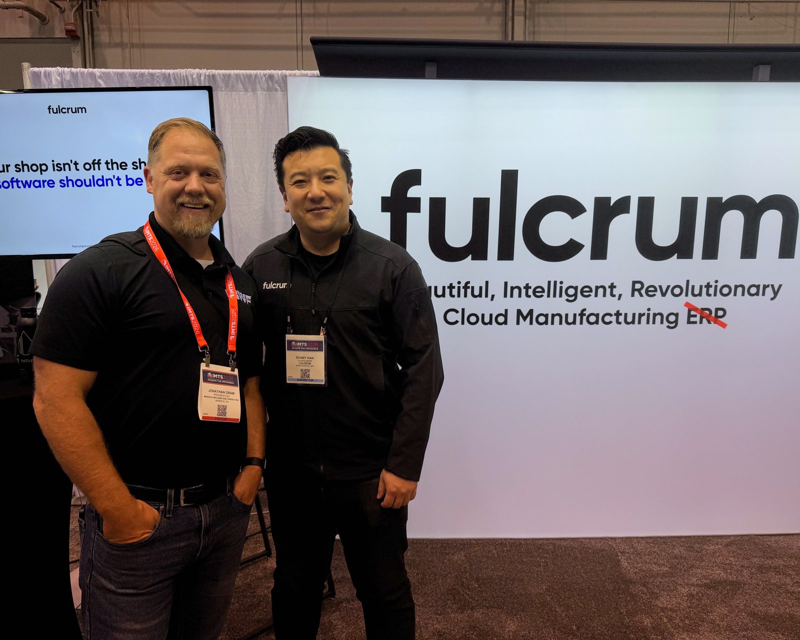 Fulcrum customer with CEO Sunny Han at the booth