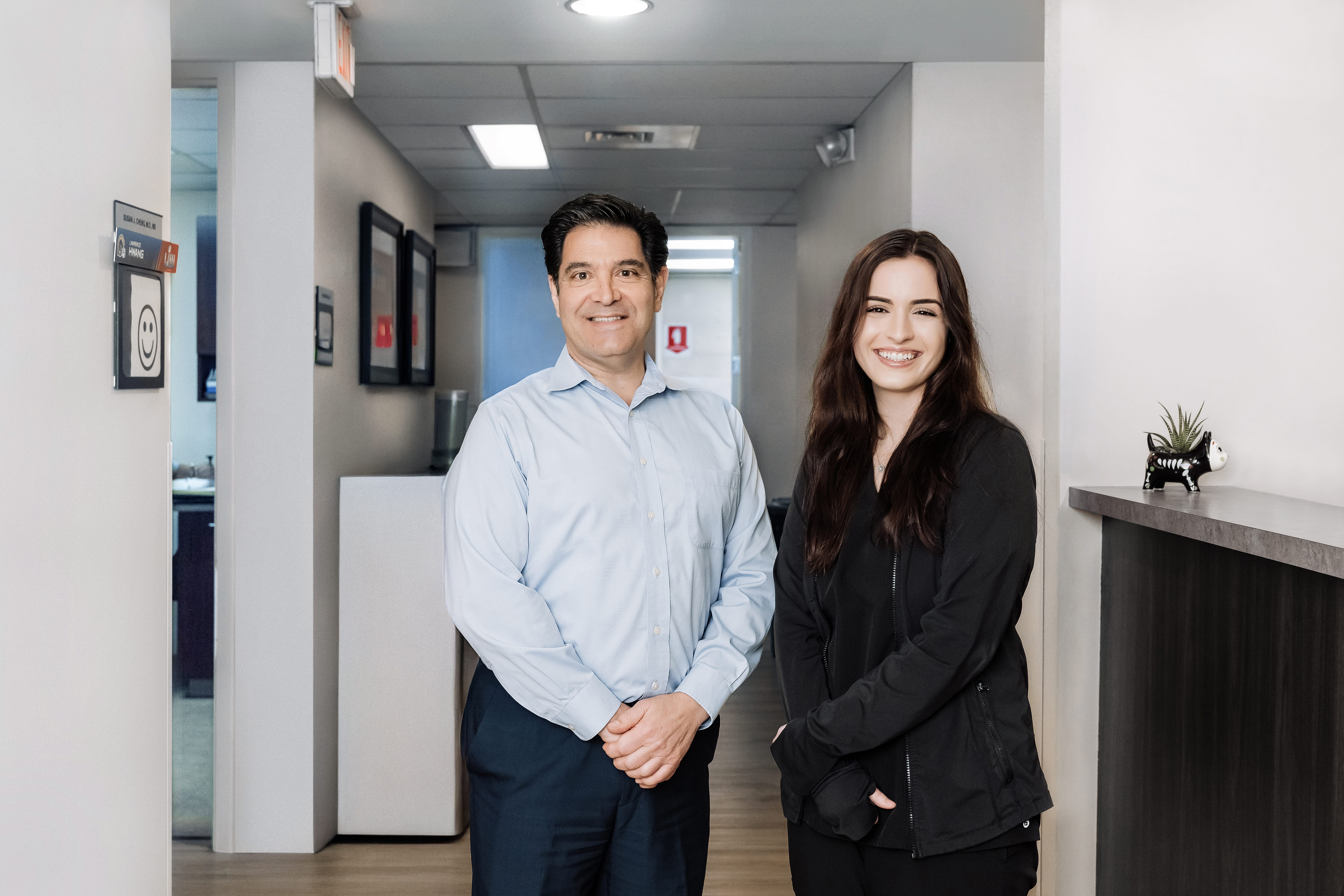 Dr. de la Peña talking with patient