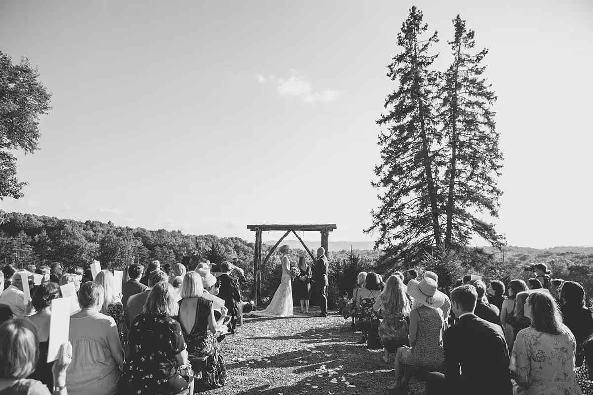 Black and white photo of wedding ceremony at the farm
