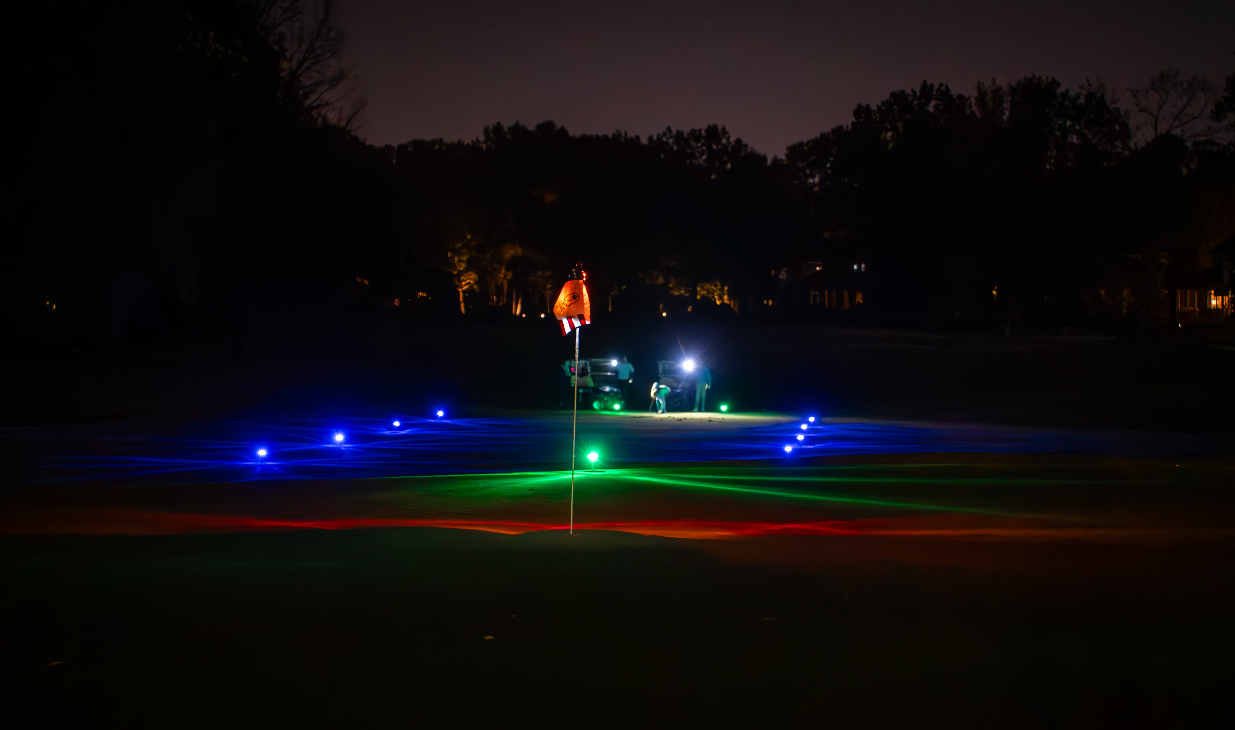 On-course glow golf at night