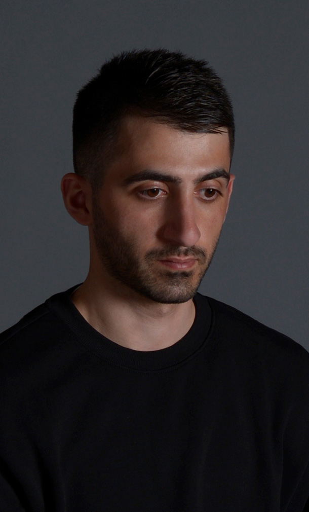 A portrait picture of Husham Sam