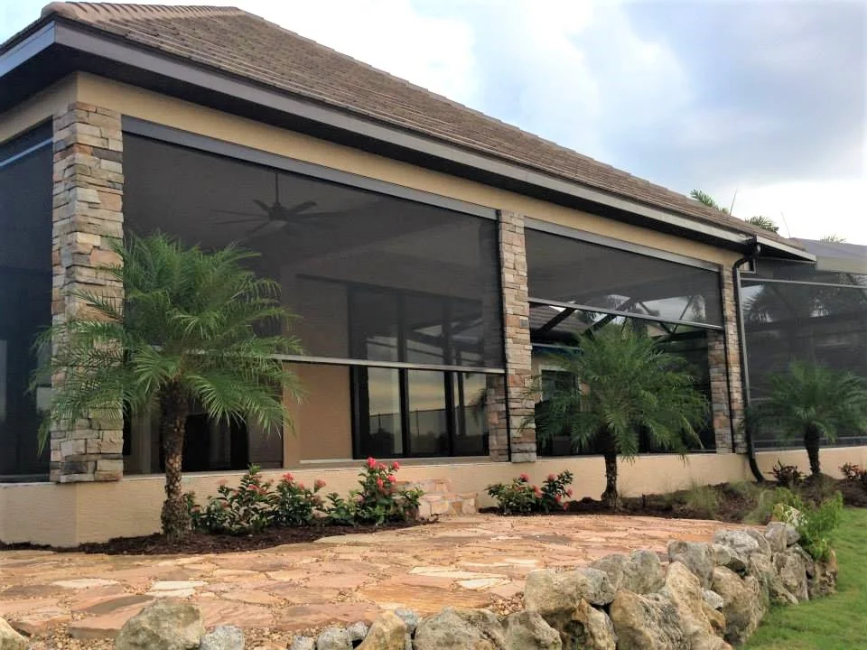 Custom exterior shade screen application on residential outdoor living space