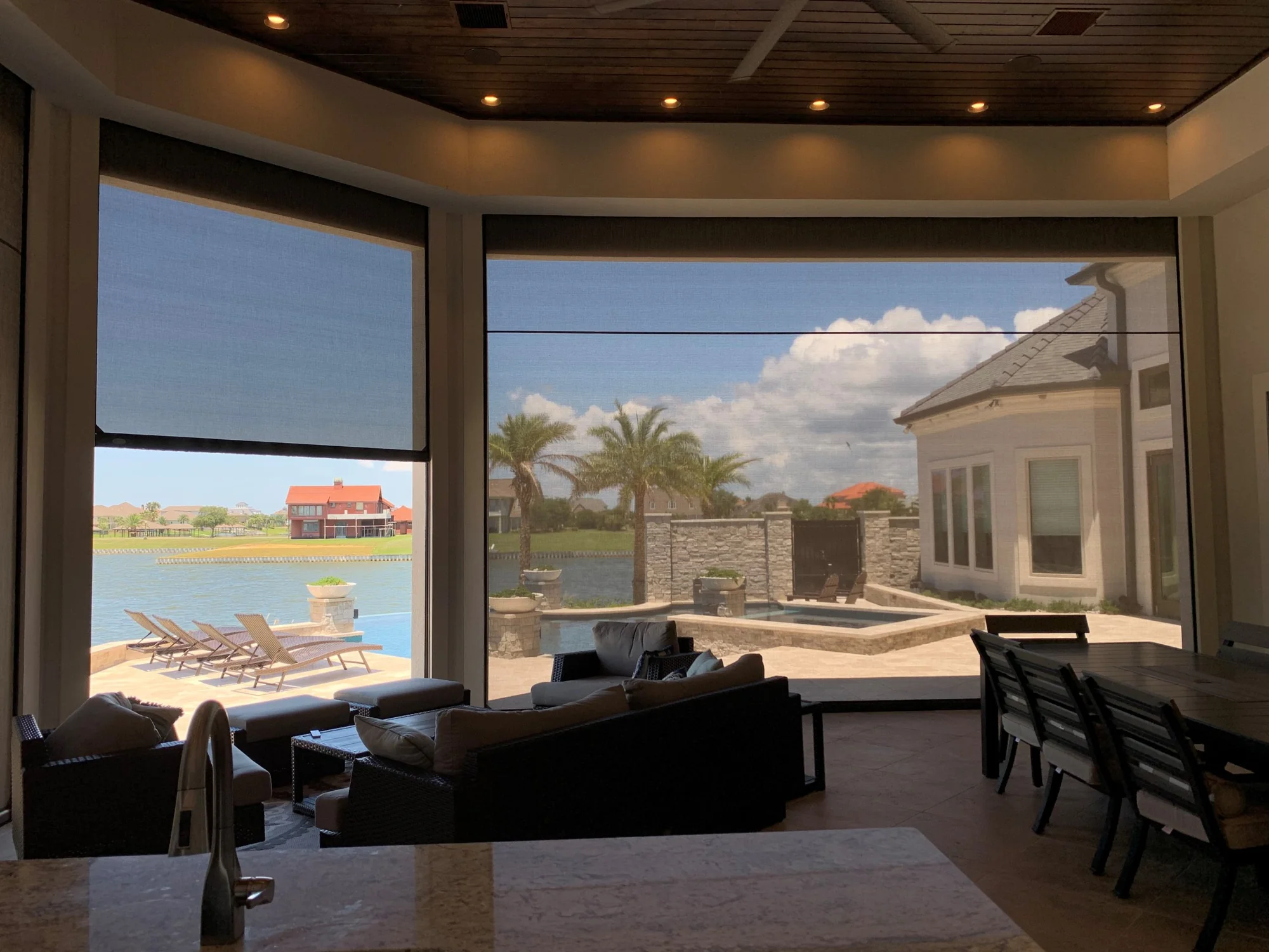Recessed patio shade screen installed flush with home exterior