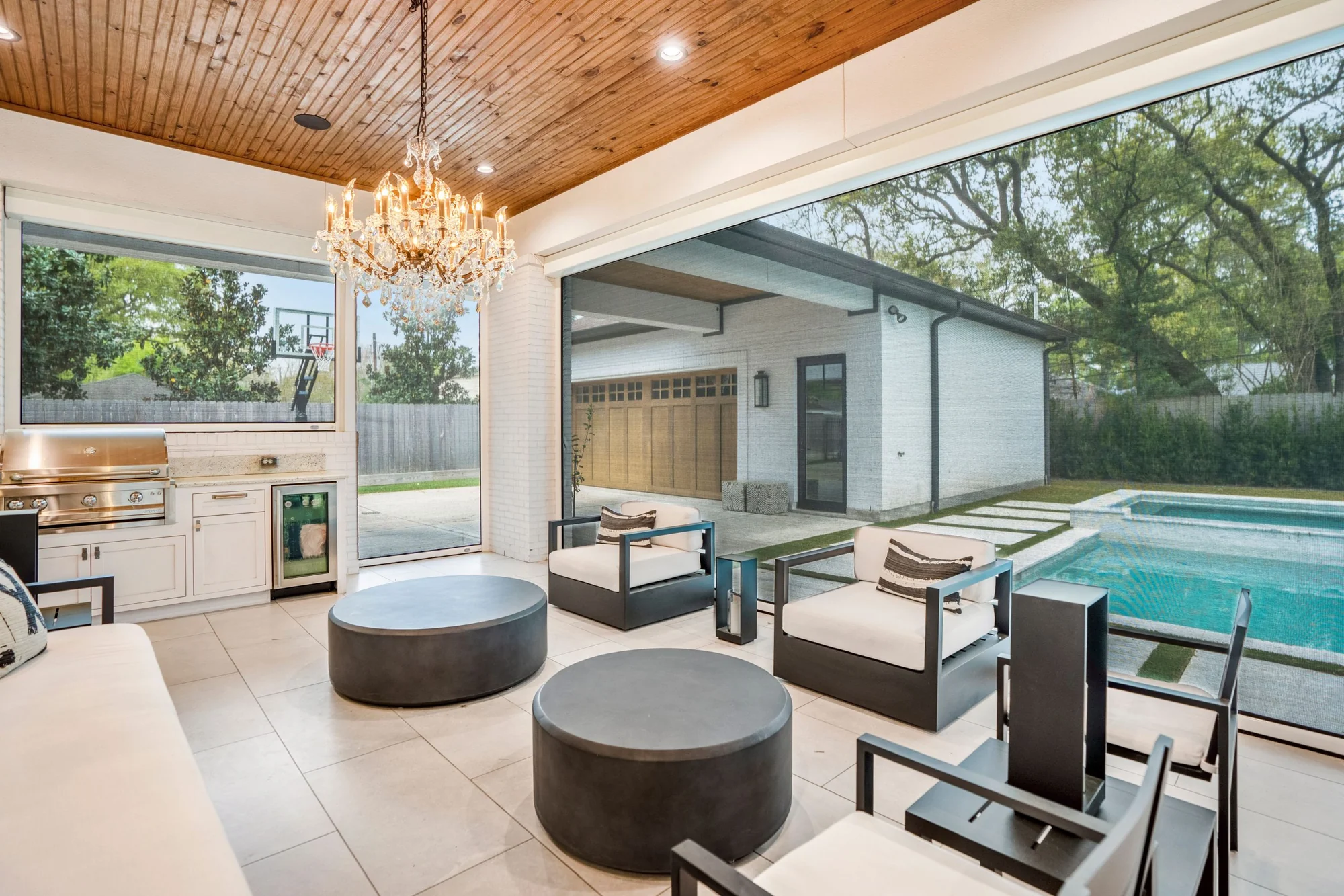 Custom retractable shade screens on a residential patio in Texas