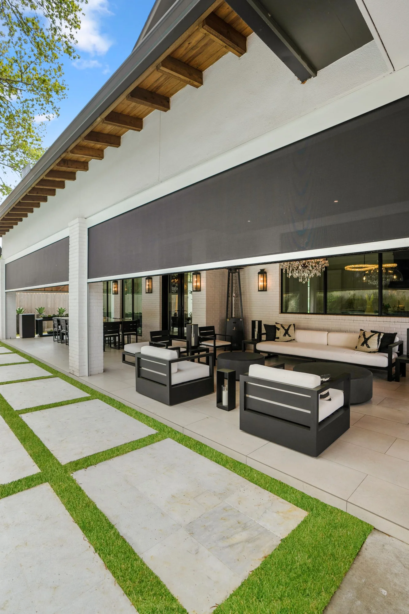 Outdoor retractable patio shade screens installed on Texas home