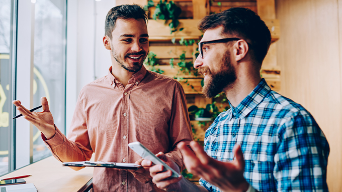 Happy men doing business