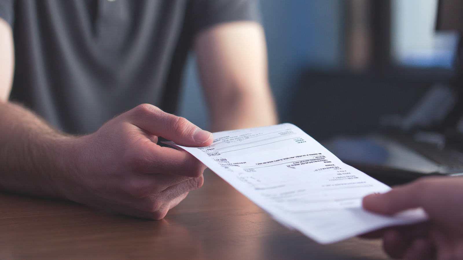 a man giving an invoice