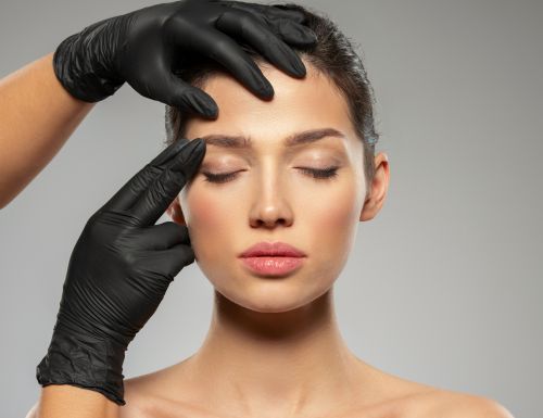 A woman's face after microneedling treatment