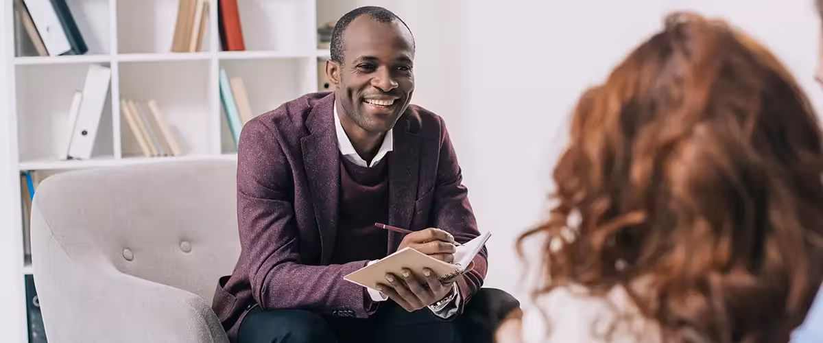 Private Psychologist speaking with patient in the UK. Average cost of seeing a private psychologist in the UK