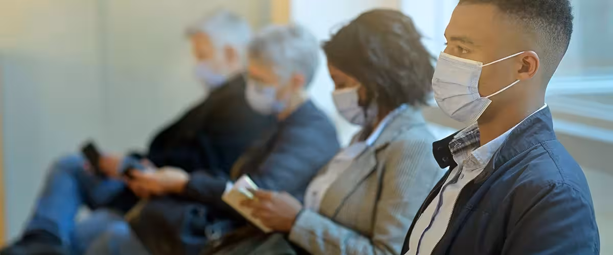 People waiting in an NHS hospital for an appointment. NHS waiting lists.