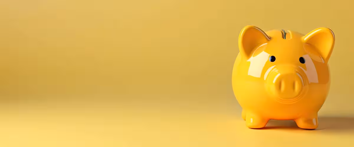 A yellow piggy bank representing the concept of savings. One Trick To Save Around 20% On Your Private Health Insurance