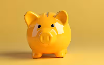 A yellow piggy bank representing the concept of savings. One Trick To Save Around 20% On Your Private Health Insurance
