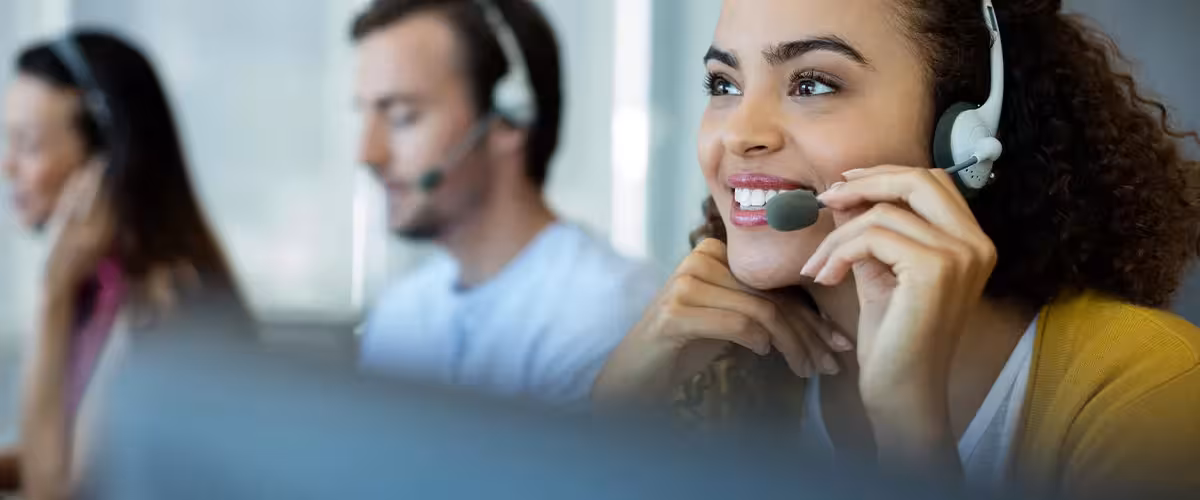 Multi-ethnic customer service executive working. Why Customer Service Matters When It Comes To Private Health Insurance