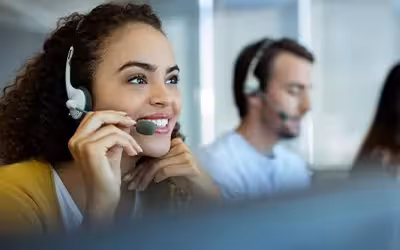 Multi-ethnic customer service executive working. Why Customer Service Matters When It Comes To Private Health Insurance